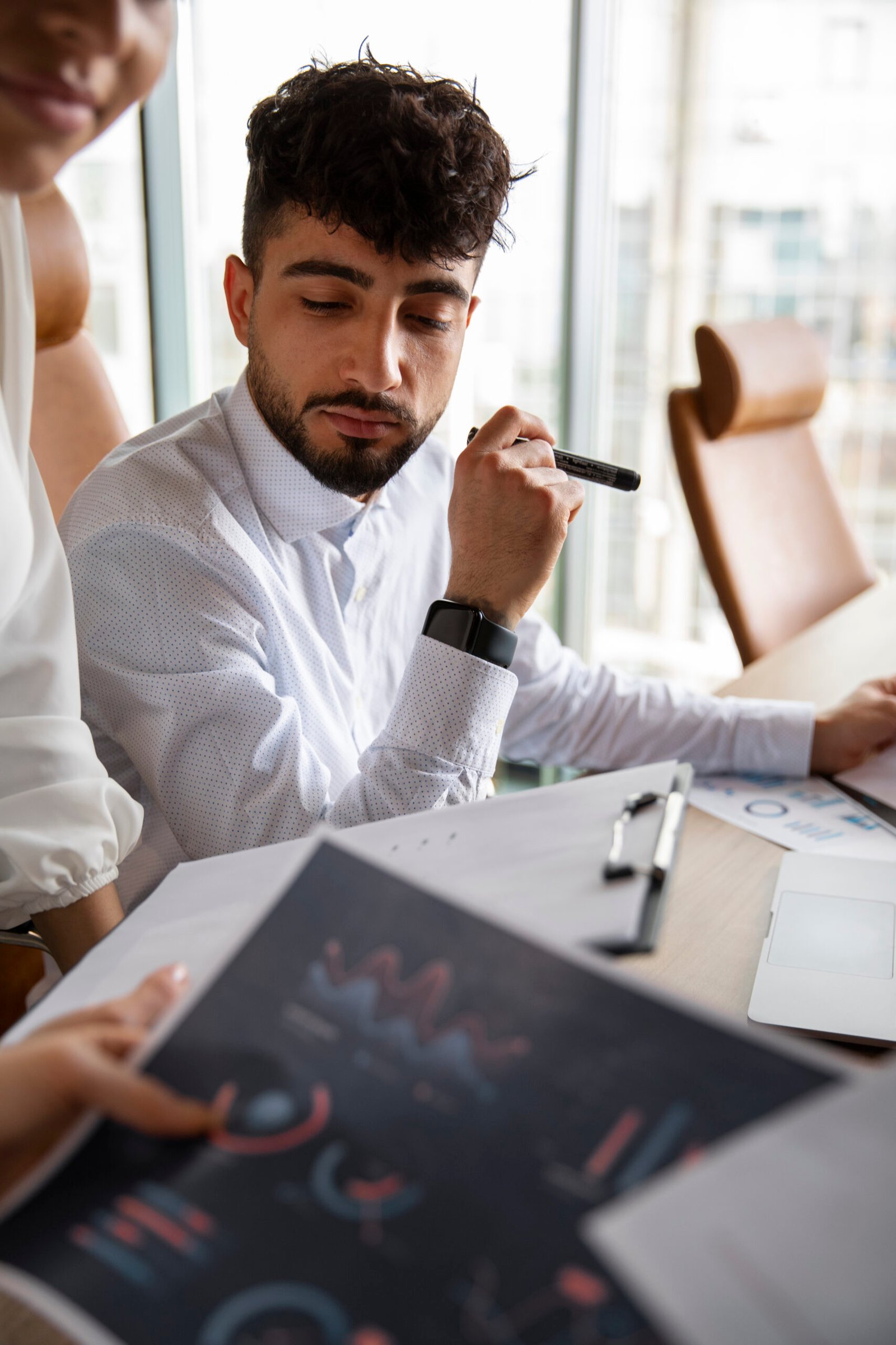 office-workers-using-finance-graphs